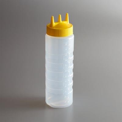 Traex Color-Mate 24 Oz. Clear Tri Tip Wide Mouth Squeeze Bottle With Yellow Cap; 12 Each; 1 Per Case